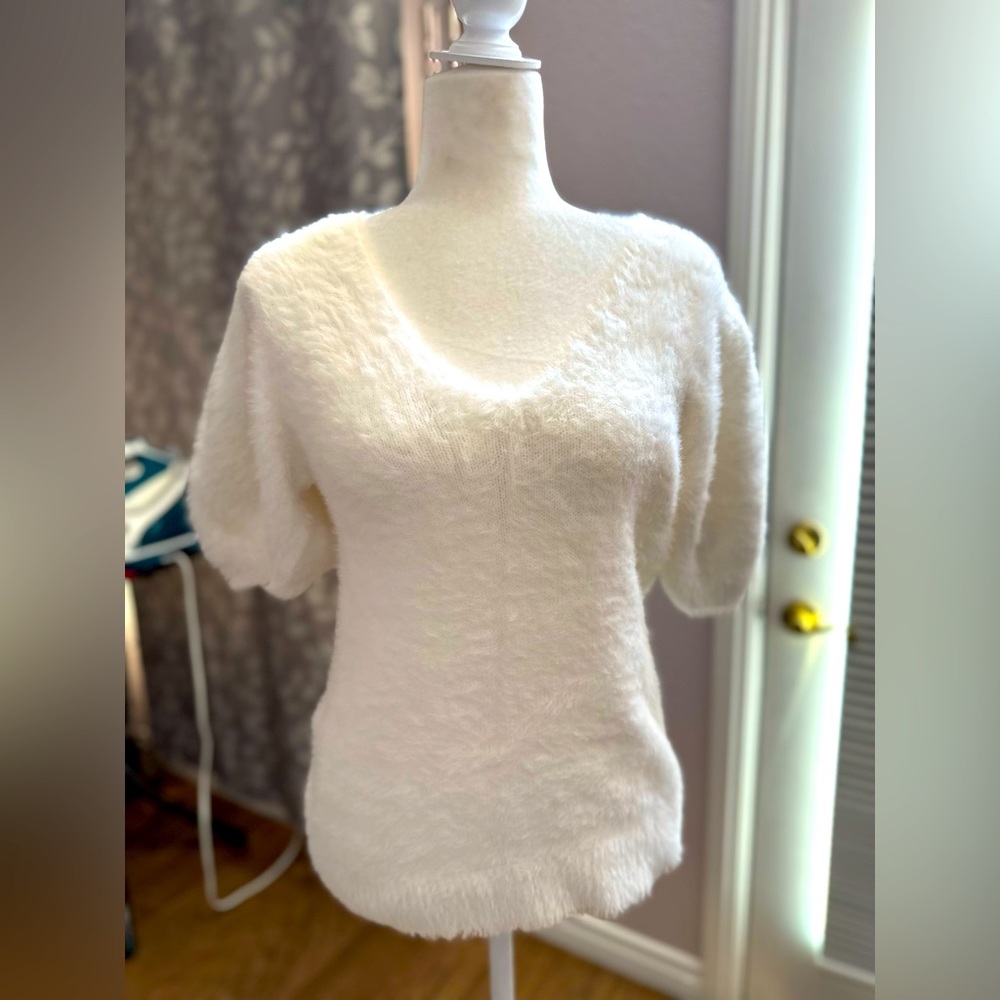 White soft, fuzzy sweater, puffy sleeves, size small